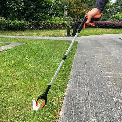 Orange-handled reacher picking up a small object