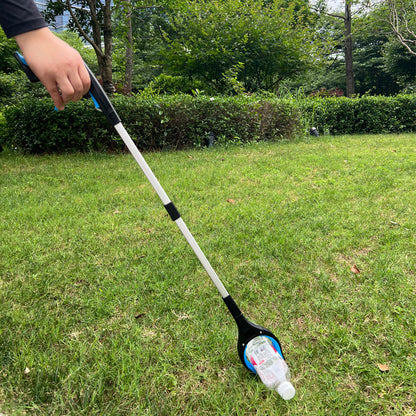 Reacher picking up a plastic bottle from grass