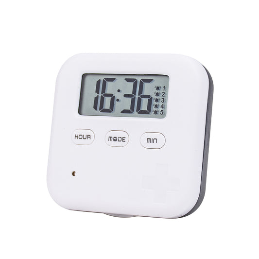 White and gray reminder pill box with clock display